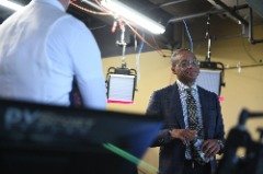 Gus Johnson in rehearsals before broadcasting the 2018 Big Ten Football Championship Game.